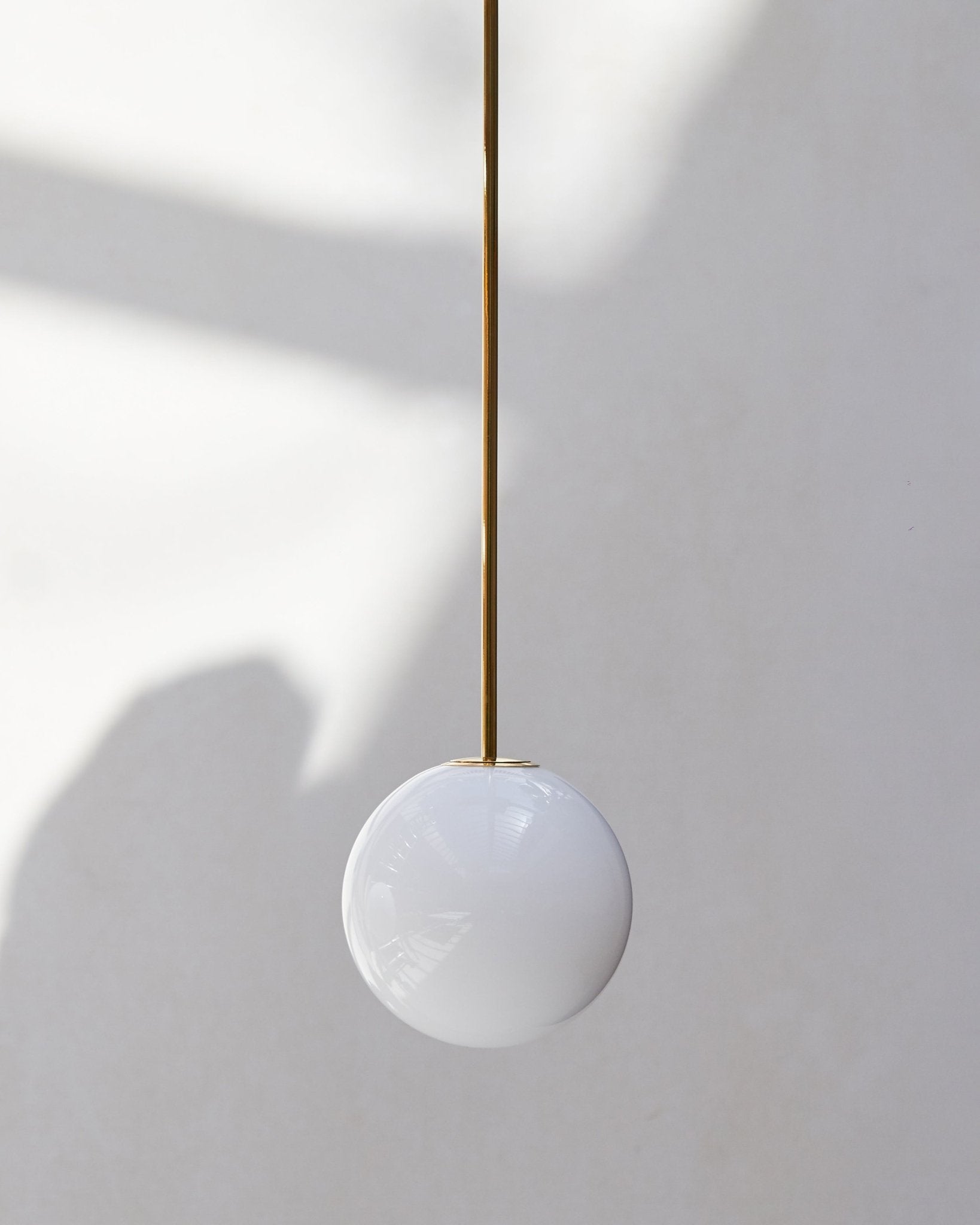 Brass Pendant Lamp | Mouth-Blown Opal Glass, Adjustable Height & Ideal for Modern Indoor Spaces