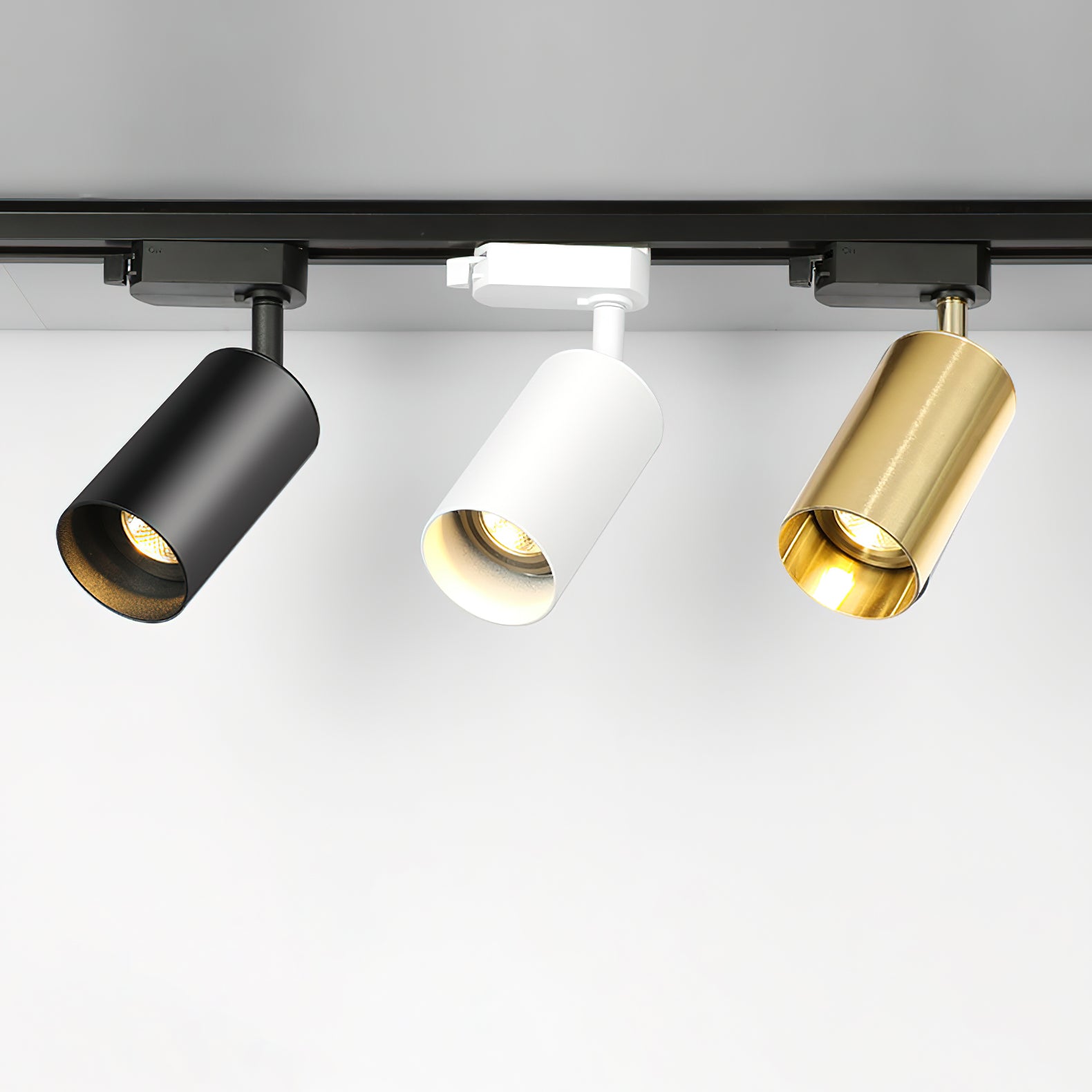 Gilded Rail Track Light | Sleek Gunmetal Black with Golden Cylindrical Heads for Indoor Modern & Industrial Decor
