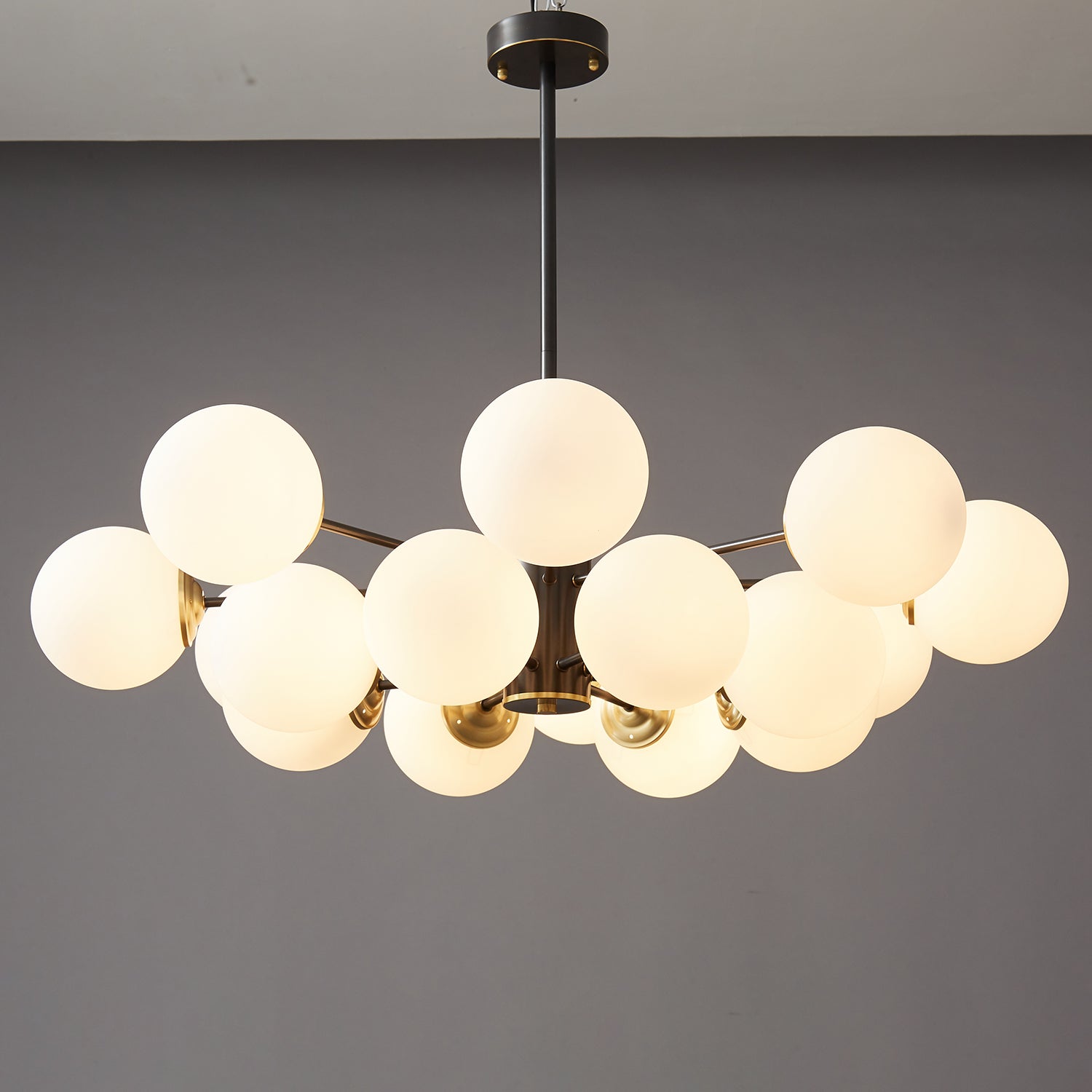 Modern Brass Orb Chandelier | Frosted Glass, 6-8 Lights & Ideal for Dining Rooms and Living Areas