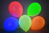 Image of Blacklight Party Balloons That Glow in The Dark Under Blacklight
